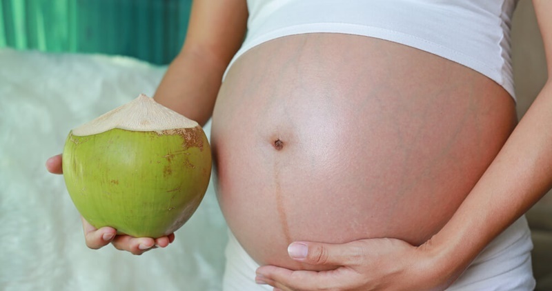 Có những tác dụng phụ nào nếu mẹ bầu uống quá nhiều nước dừa khi thai 13 tuần?
